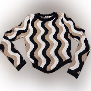 Women's size small sweater open in the back with a tie. Like new